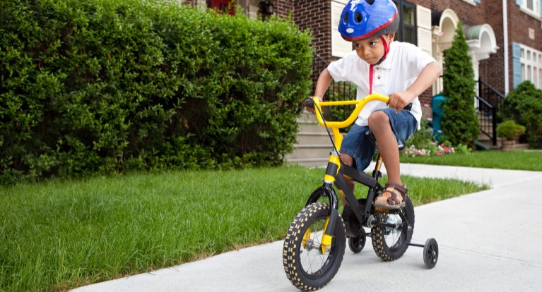 Boy on 12-inch kids' bike